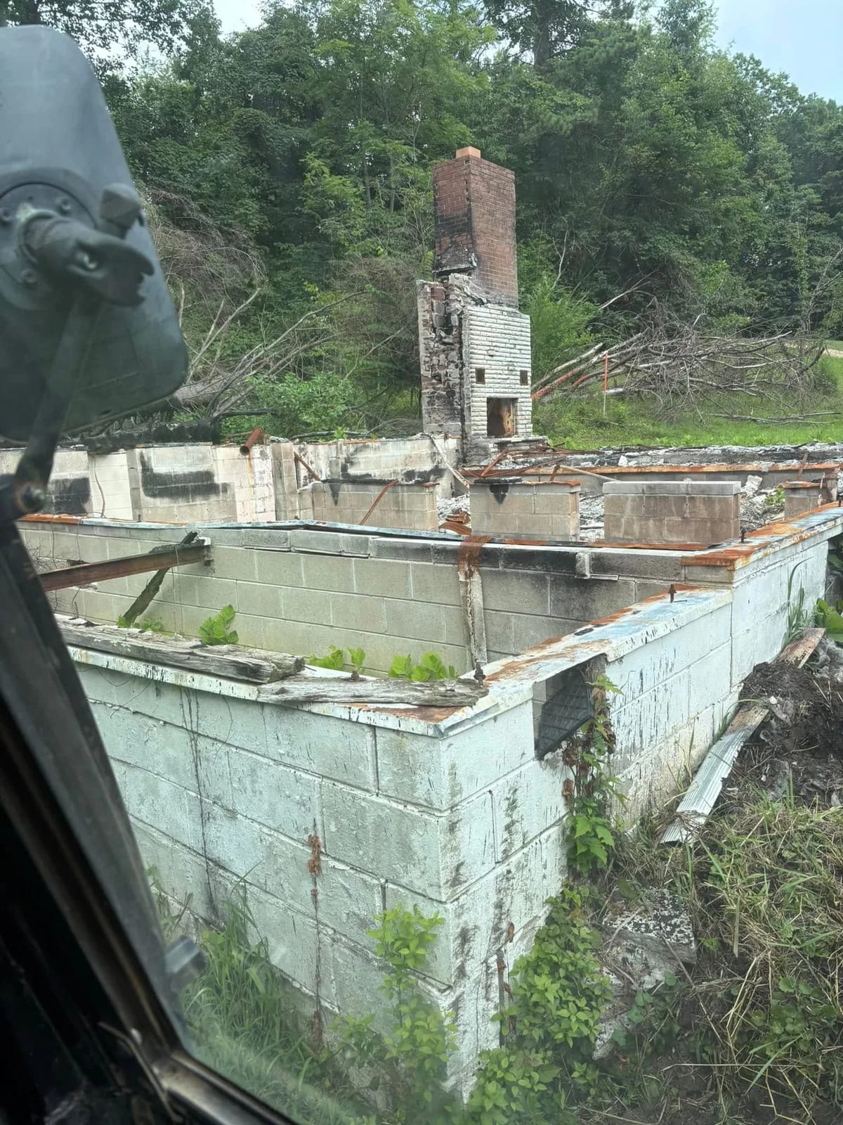 Block walls of an old building coming down during demolition