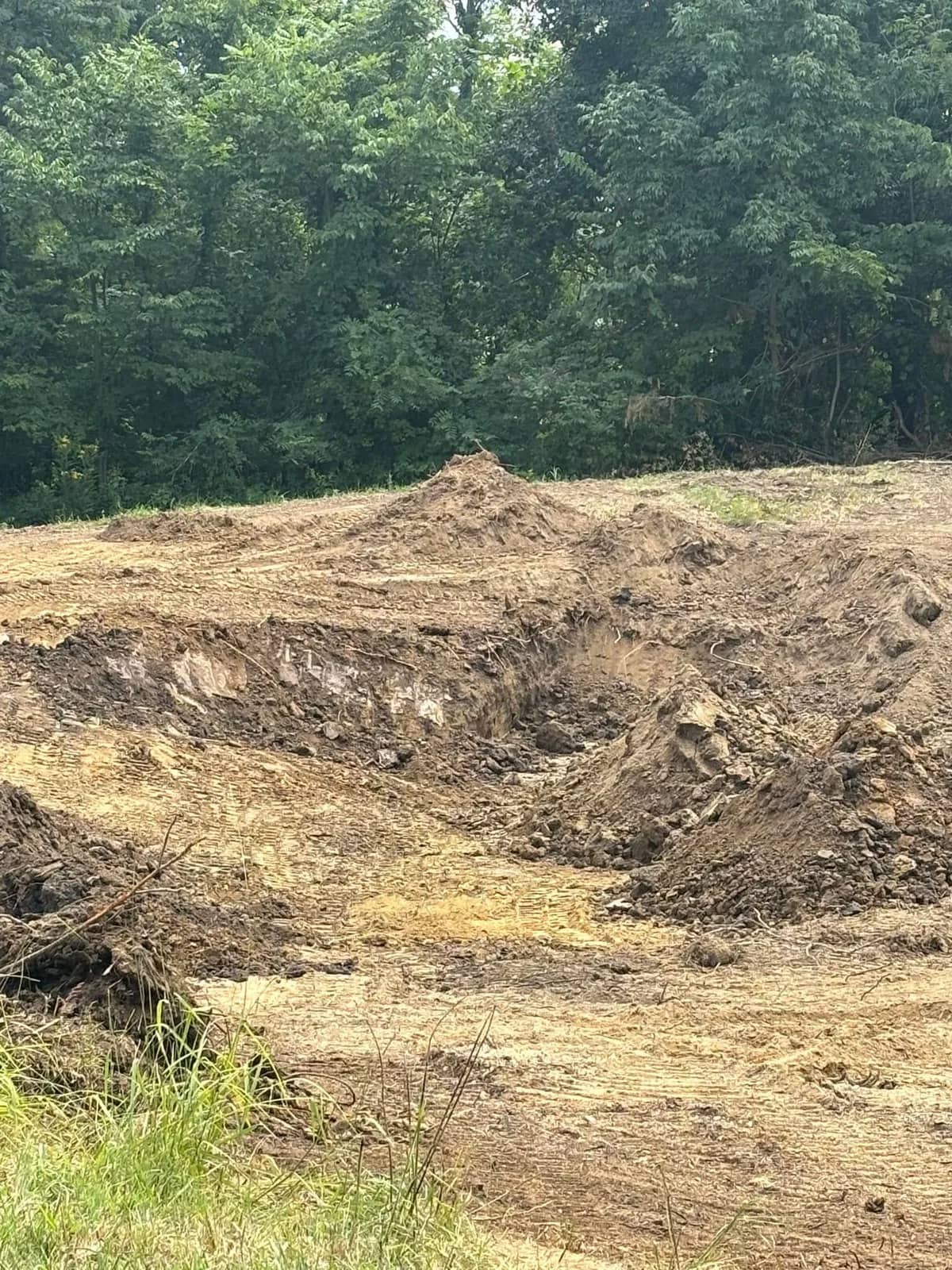 Excavated dirt slope on a pond site