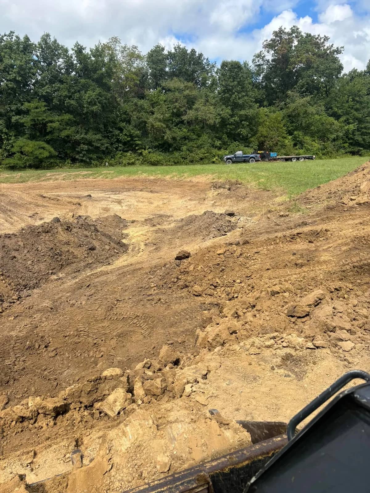 Fresh dirt mound at an excavation site