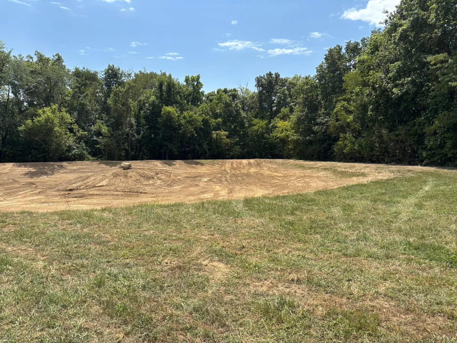 Graded site finished at the tree line